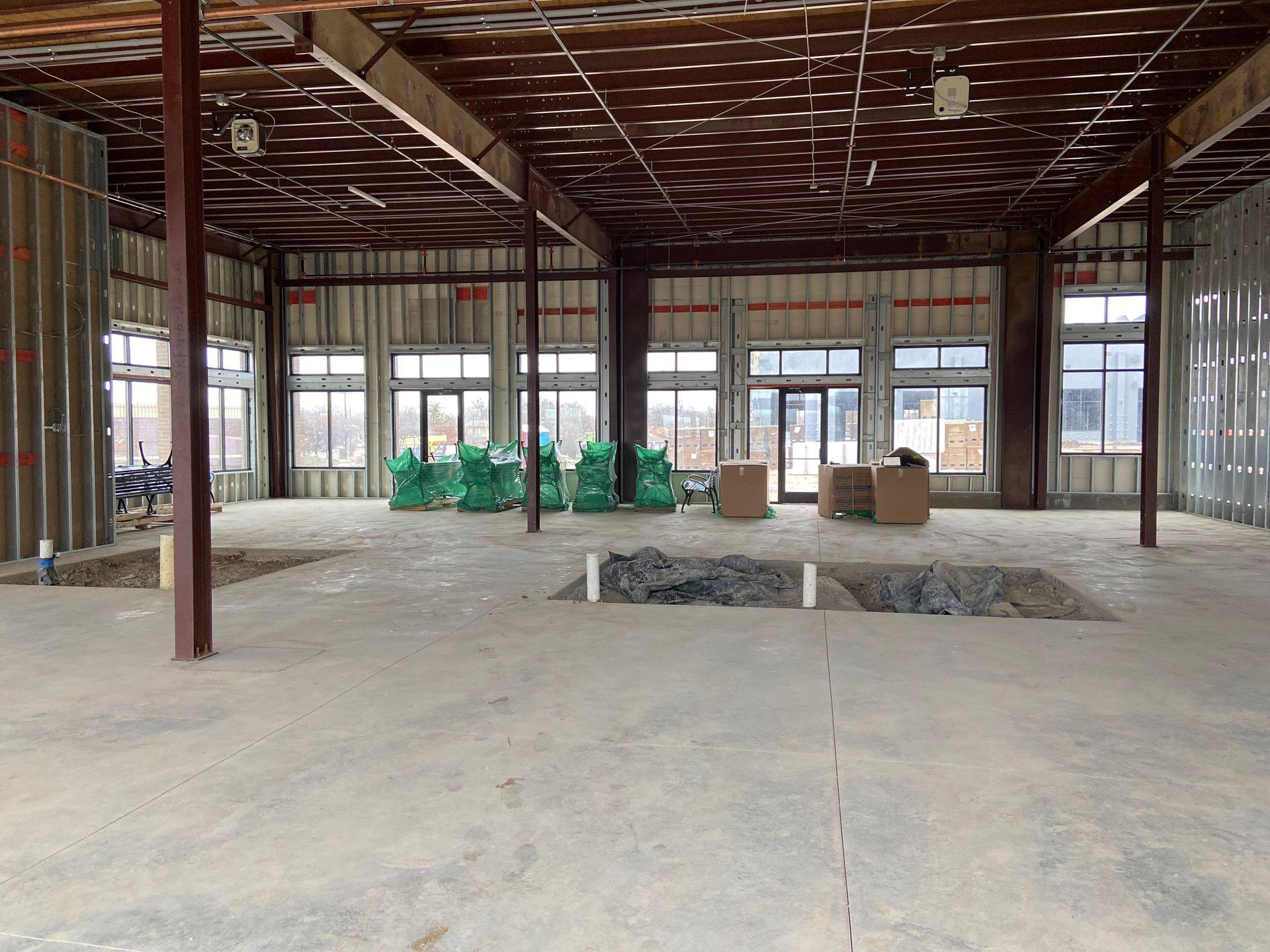 Before: the empty shell space that became Professional Black Belt Academy in Celina, TX
