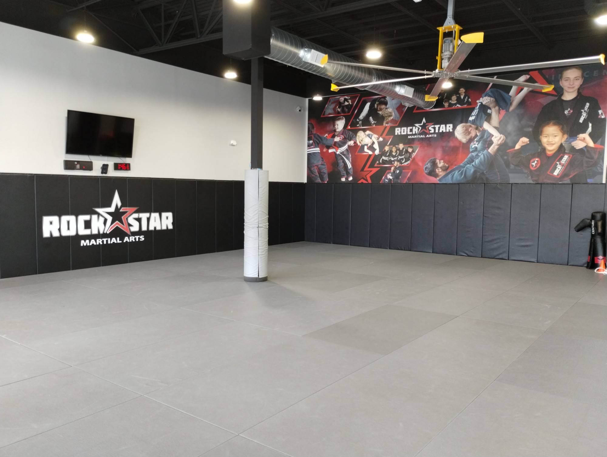 Finished training floor and mat wall at Rockstar Martial Arts in Frisco, TX