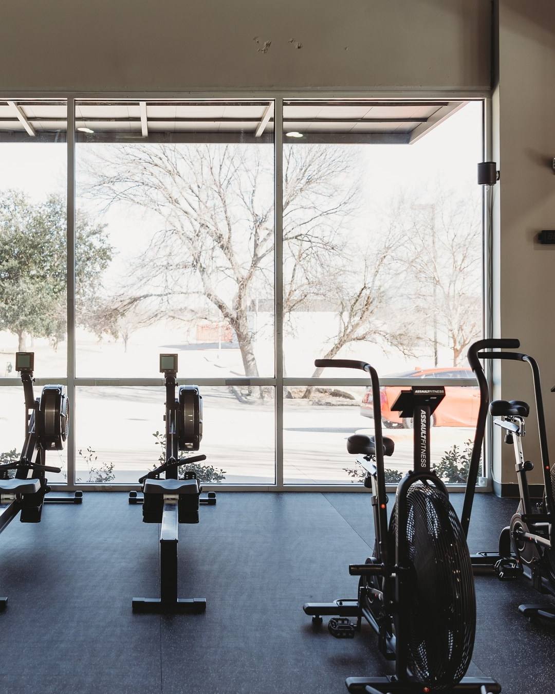 Completed fitness floor with storefront glazing at Kung Fu Academy of North Texas