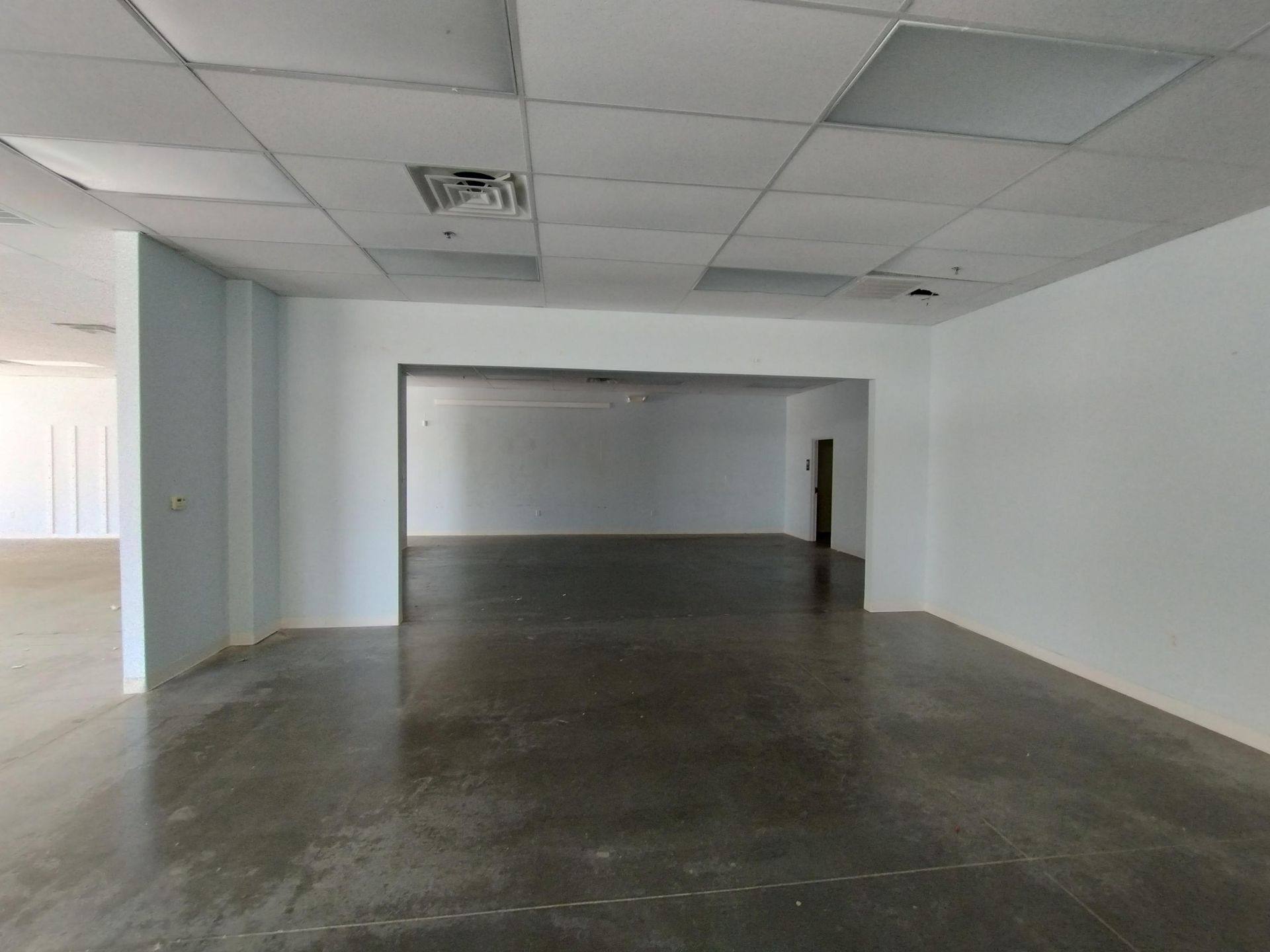 Before: an interior room in the retail space that became Kung Fu Academy of North Texas in McKinney, TX