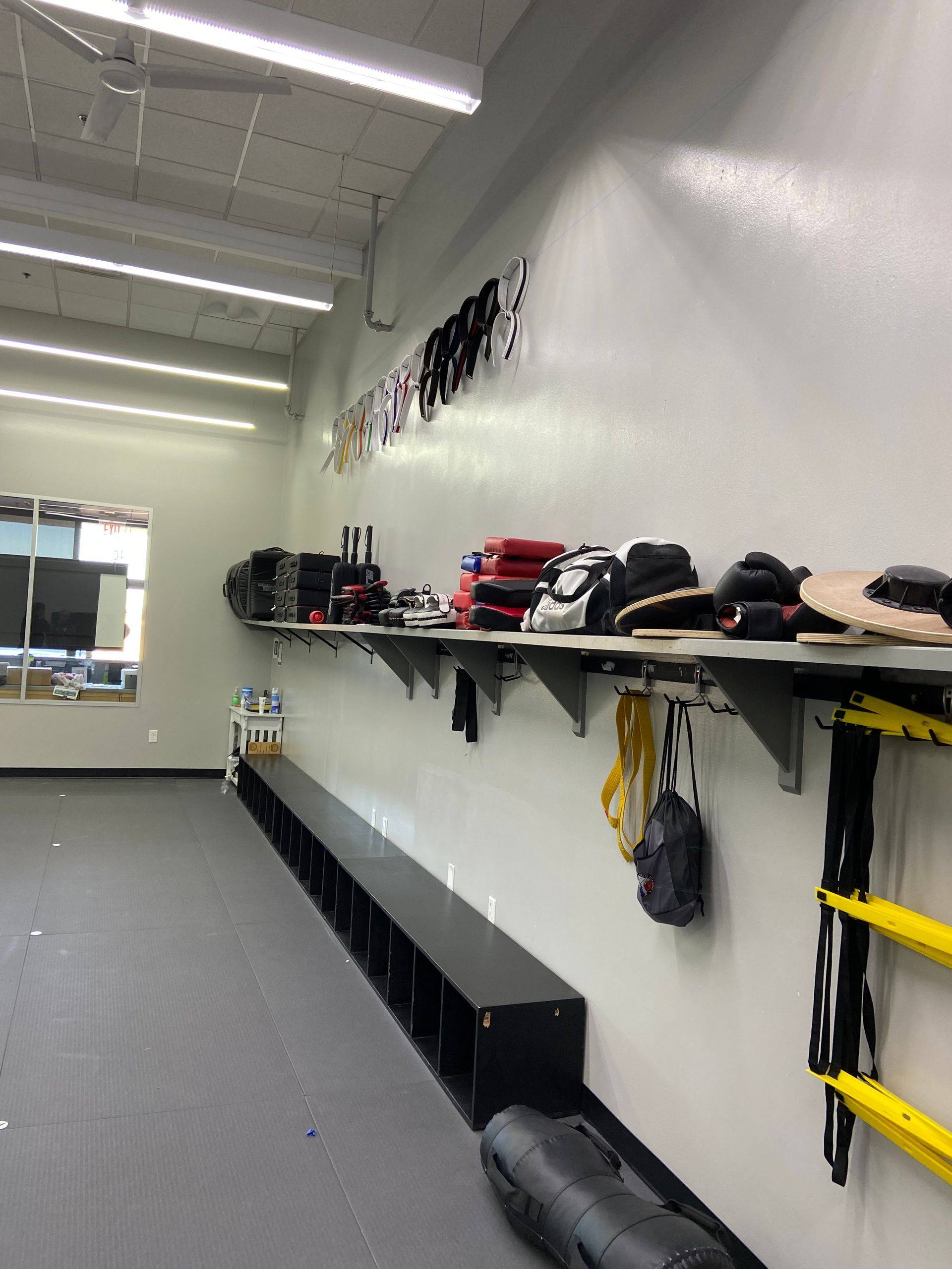 Before: the equipment area at Professional Black Belt Academy in Prosper, TX