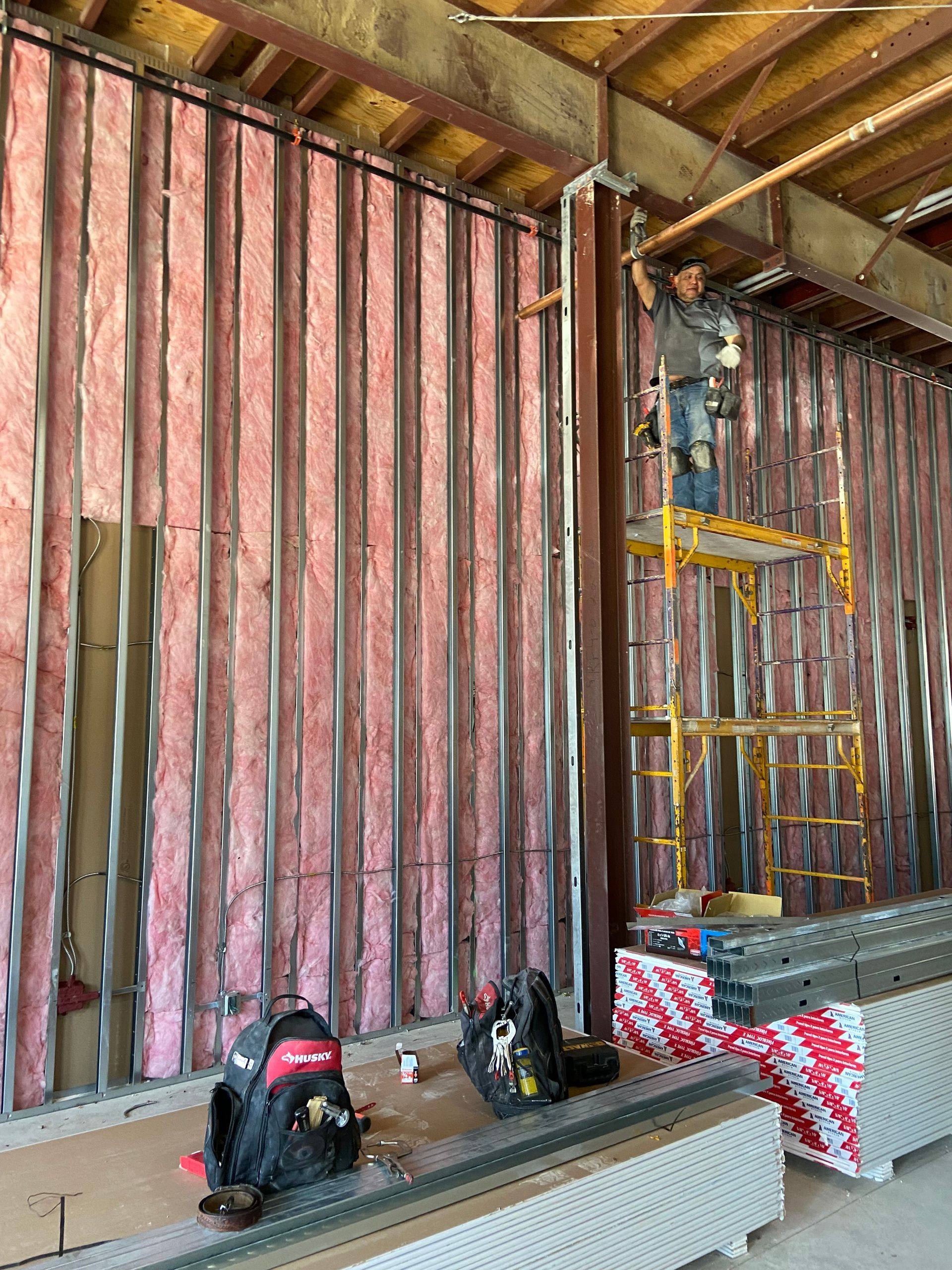 A further view of the Professional Black Belt Academy shell space finish-out in Celina, TX