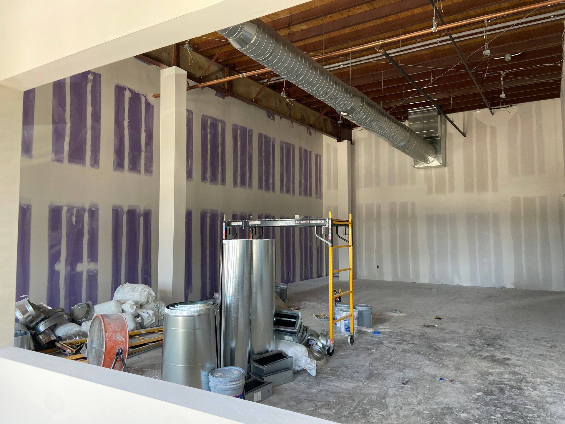 Another view of the Professional Black Belt Academy shell space finish-out in Celina, TX