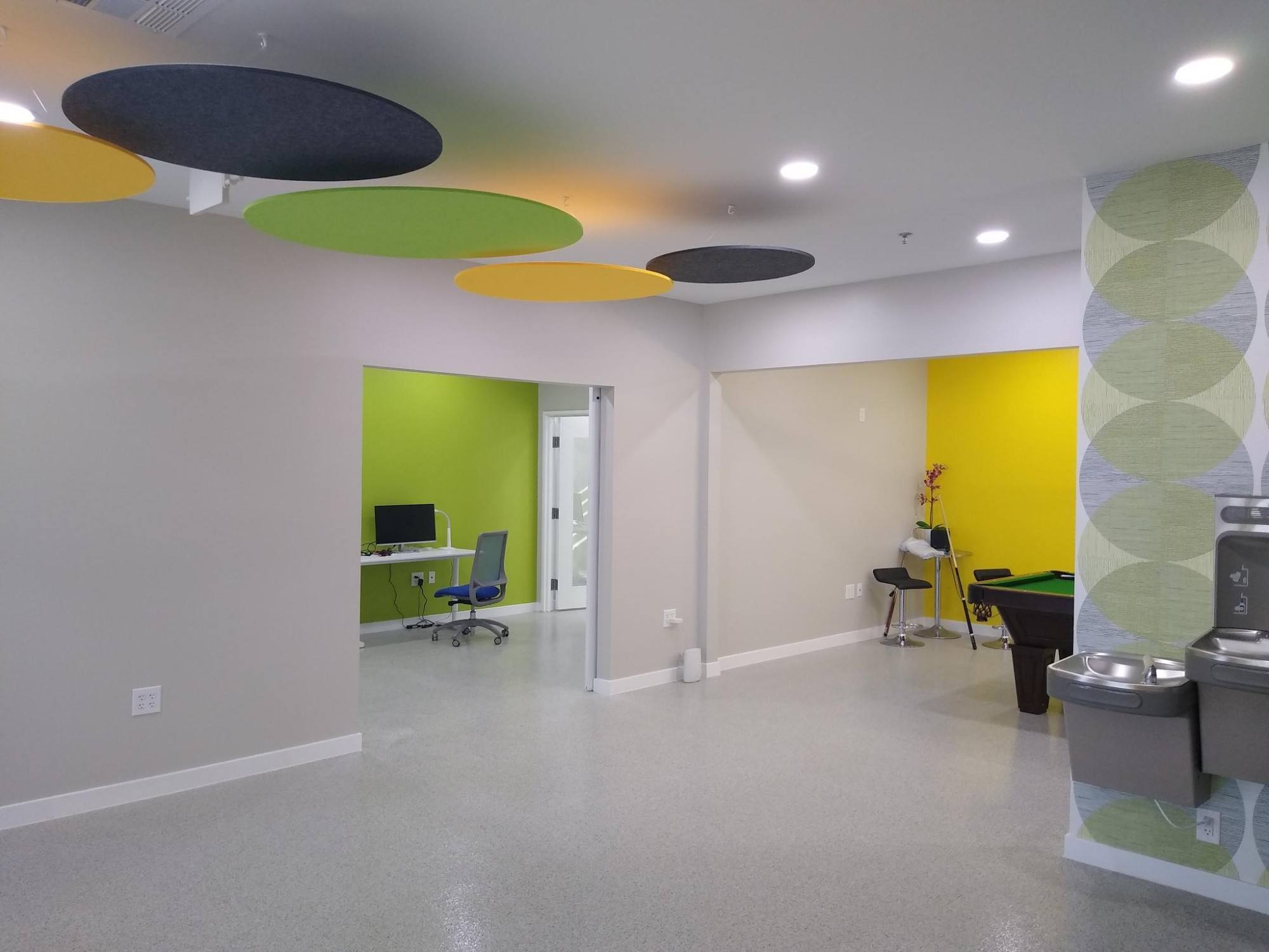 Finished open office and break area at Vzure Solutions in Frisco, TX